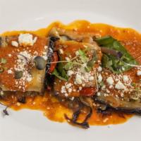 Rollatini · Eggplant rolls baked with light tomato sauce and feta.