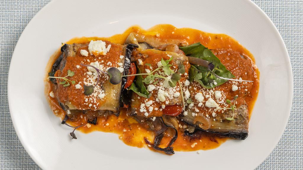 Rollatini · Eggplant rolls baked with light tomato sauce and feta.
