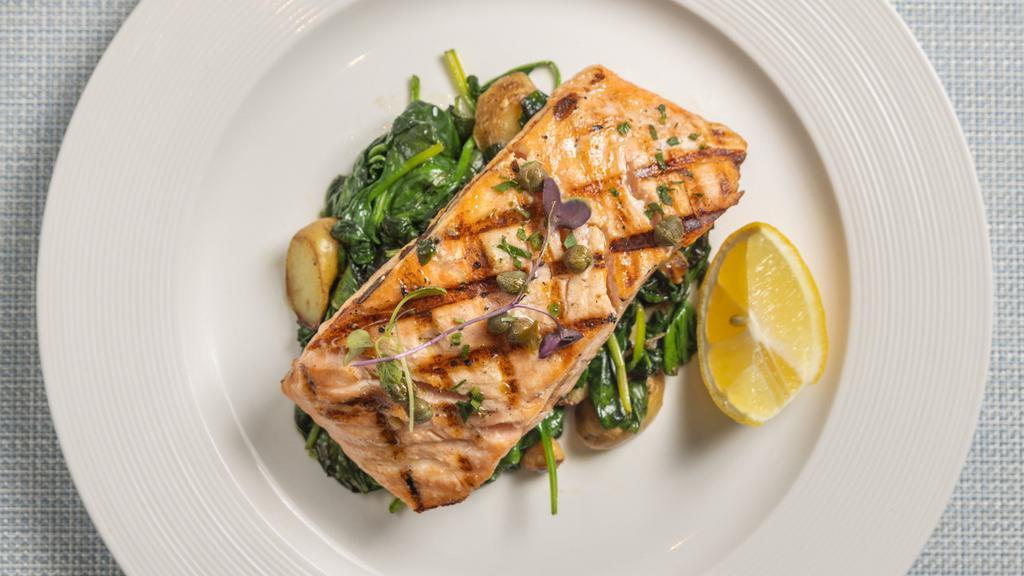 Salmon · Wild salmon with sautéed spinach, chick peas and fingerling potatoes.
