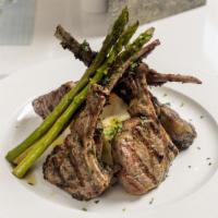 Lamb Chops · Four charcoal grilled lamb chops, smashed potatoes, grilled vegetables.