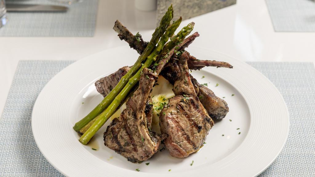 Lamb Chops · Four charcoal grilled lamb chops, smashed potatoes, grilled vegetables.