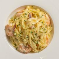 Shrimp Linguini · Sautéed gulf shrimp, extra virgin olive oil, santorini wine, garlic, onions and cherry tomat...