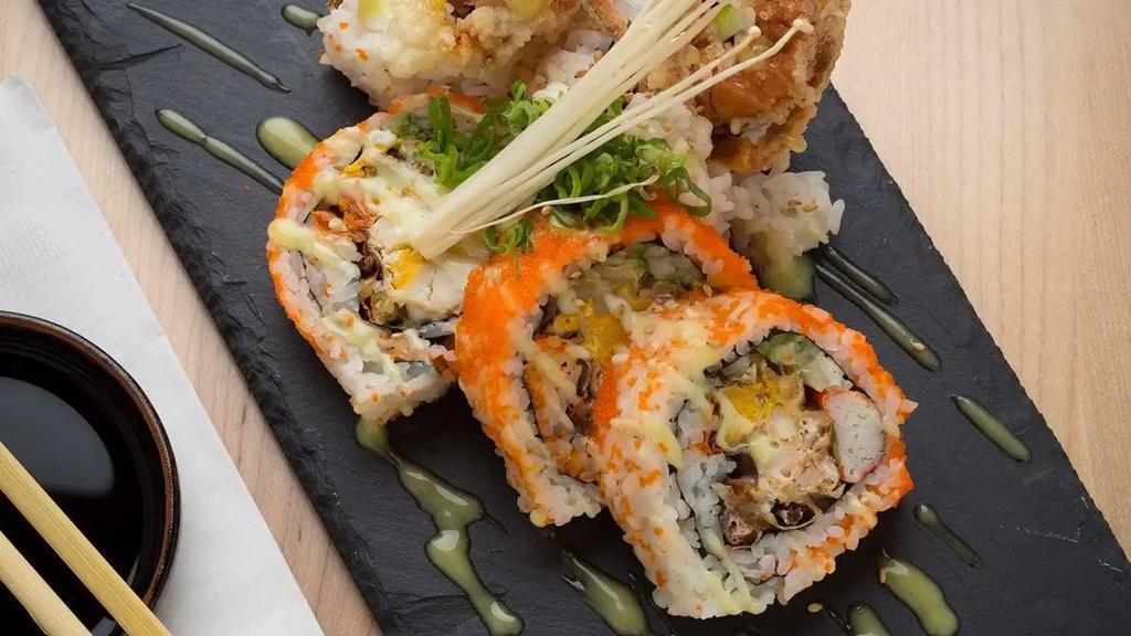Spider Roll · Crispy fried soft shell crab avocado and cucumber with caviar on top