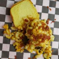 The Fantastic 4 Mac & Cheeseburger · Stuffed and topped with Nani's 4-cheese Mac & Cheese, bacon.

Consuming raw or undercooked m...
