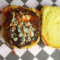 The Blue Beetle Buffalo Burger · Stuffed and topped with blue cheese crumbles, buffalo sauce.

Consuming raw or undercooked m...