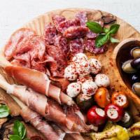 Cold Antipasto · Cold Italian appetizer with meat and vegetables.