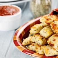 Garlic Bread With Cheese · Buttery bread that is topped with garlic and cheese.