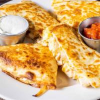 Chicken Quesadilla · Jack and Cheddar cheeses, salsa and sautéed onions wrapped in a tortilla.
