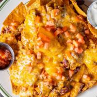 Rudy’S Nacho’S · Tortilla chips, chili and Cheddar cheese, salsa and sour cream.