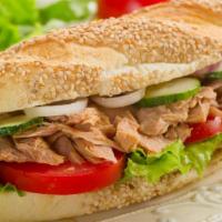 Tuna Fish Combo Sandwich · Sandwich with tuna fish, onion, tomato, lettuce, and Canadian bacon.