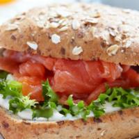 Nova Scotia Salmon Combo Sandwich · Bagel sandwich with salmon, cream cheese, lettuce, tomato, and onion.