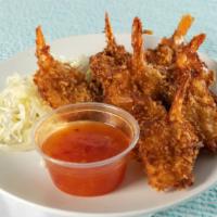Coconut Shrimp · 8 butterflied jumbo shrimp served with orange-chili dipping sauce