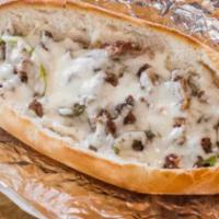 Philly Cheese Steak Sandwich · Served with onion and pepper.