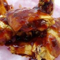 10Pc Honey Bbq Fusion Wings · Honey BBQ sauce mixed with our garlic chili sauce.