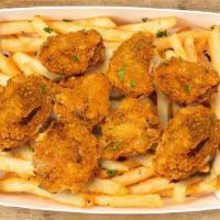 Small Mushroom Popper Basket (8 Pc) · [Vegan] 8 bite-sized crunchy crimini mushrooms with your choice of three sauces and either c...
