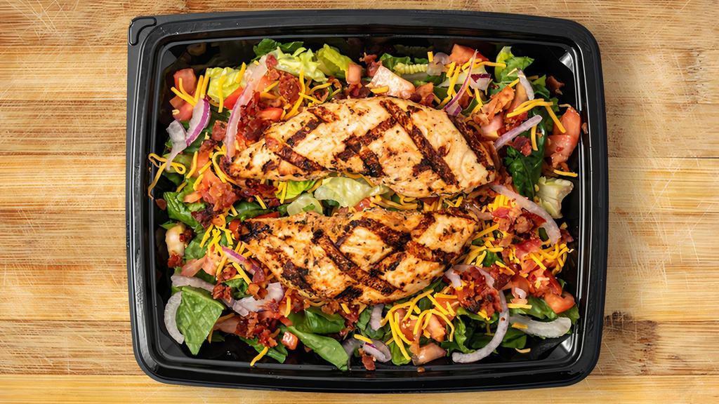 Ranch Blt Salad · Two fingers: crunchy, grilled, or veggie over a bed of greens, tomatoes, red onions, cheddar, chopped bacon, buttermilk baby ranch. Make it spicy by adding buffalo balsamic maple.