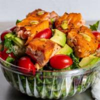 Salmon Kale Salad · Mixture of kale and crisp lettuce, quinoa, avocado, grape tomatoes, cucumbers, garbanzo bean...