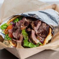 Filet Mignon Pita Wrap · Served with lettuce, tomatoes, red onion and tzatziki sauce.