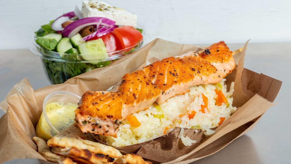 Salmon Platter · Grilled and Served with a SIDE SALAD , your choice of ONE OTHER  SIDE, pita bread and homemade tzatziki sauce.