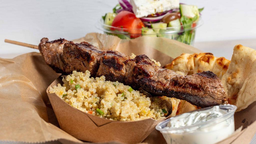 Filet Mignon Platter · Served with a SIDE SALAD , your choice of ONE OTHER  SIDE, pita bread and homemade tzatziki sauce.