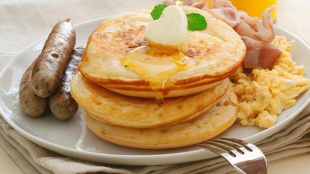 Plain Pancakes Platter · 2 fluffy buttermilk pancakes with choice of meat, eggs and cheese!