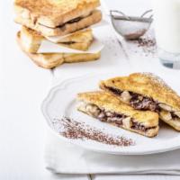 Chocolate French Toasts Platter · 2 fluffy chocolate french toasts with choice of meat, eggs and cheese!.