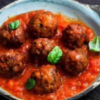 Meatballs · Middle eastern meatballs, made with onions, spices and marinated in tomato sauce.