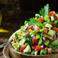 Egyptian Salad  · Lettuce, tomatoes, red onions, peppers, cucumbers, parsley mixed with lemon, salt, cumin, an...