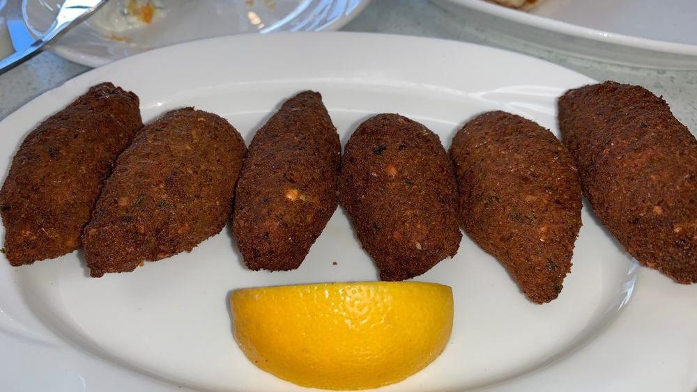 Falafel (5) · Served with salad, pita, and 1 side (brown rice, french fries or lemon potatoes). 2oz Tzatziki