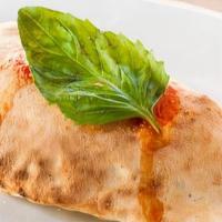 Calzone Classico · Classic calzone with tomato sauce and mozzarella.