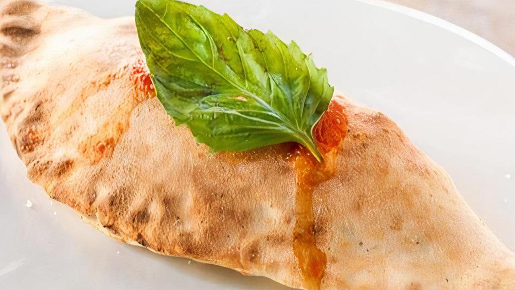 Calzone Napoli · Tomato sauce, mozzarella, and anchovy.