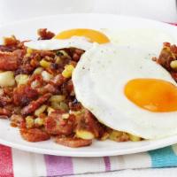 Eggs With Corned Beef · Healthy serving of 2 eggs prepared to customer's preferences, served alongside cooked Corned...