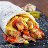 The Illegal Wrap · Breakfast wrap made with Eggs, salsalito turkey, Jack cheese and jalapeño.