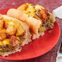 Cheesesteak With The Works · Peppers, onions, potato, and cheese.