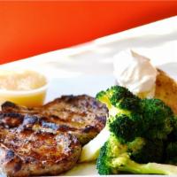Broiled Pork Chops · Two chops and apple sauce served with potatoes, vegetables, and soup.