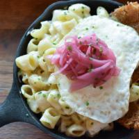 Breakfast Mac N Cheese · house made hash browns, pickled red onions, turkey sausage, sunny side up egg