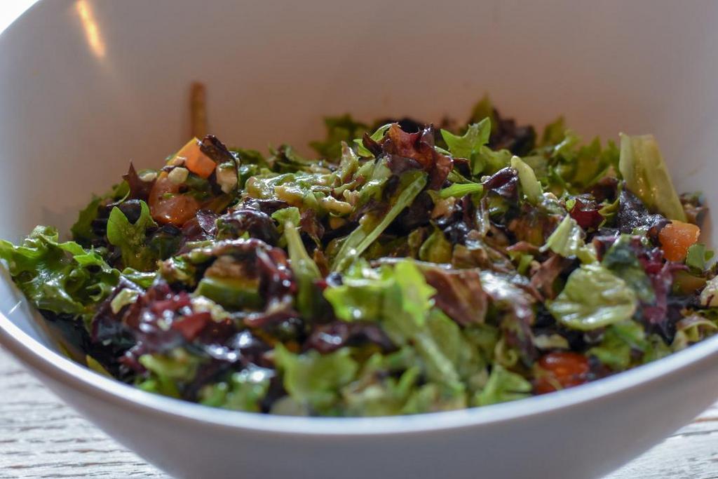 Chopped Salad · mixed greens, cucumbers, baby tomatoes, fresh mozzarella, black beans, chickpeas, champagne vinaigrette