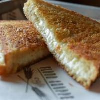 Kids Grilled Cheese · american cheese, sourdough