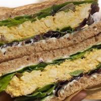Vegan Egg Salad Sandwich · Tofu Egg Salad, Vegan Mayo, Turmeric, Black Salt, Pepper, Garlic
**Sandwich Bread is Dave’s ...