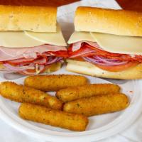 God Father Sandwich · Ham, salami, ham cappy, pepperoni, provolone cheese, lettuce, tomatoes, onions, and red wine...