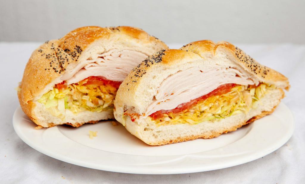 Ovengold Turkey Sandwich · Served on your choice of bread.