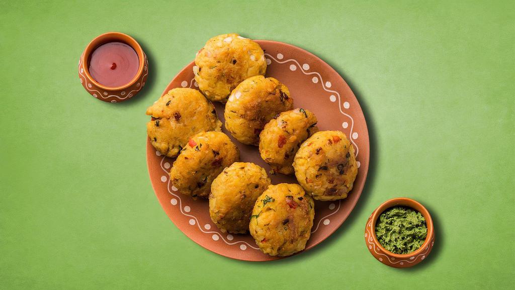 Divine Potato Croquette · Delicious snack made with boiled potatoes mixed with  aromatic spices and herbs and fried till golden and crisp.