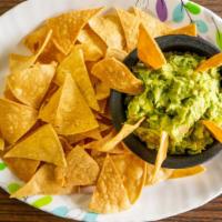 Guacamole · Served with nacho chips.