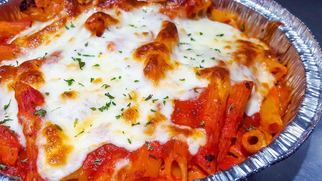 Baked Ziti · Ziti pasta baked in the oven with mozzarella, ricotta, and tomato sauce.
