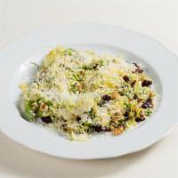 Crudo Di Cavolini · raw shaved Brussels sprouts, dried cranberries, toasted hazelnuts,. Parmigiano-Reggiano