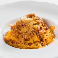 Fettuccine Alla Bolognese · traditional veal ragù, 24-month aged Parmigiano-Reggiano