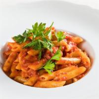 Pennette All'Arrabbiata · spicy San Marzano tomato sauce, Italian red peperoncino, garlic confit, fresh parsley