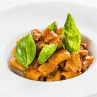 Rigatoni Strofinati · homemade rigatoni, spicy tomato sauce, Genovese basil pesto