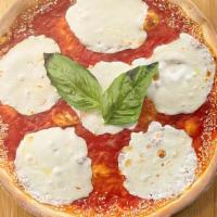 Margherita Pizza · Tomato sauce, Fresh mozzarella, sesame crust.
