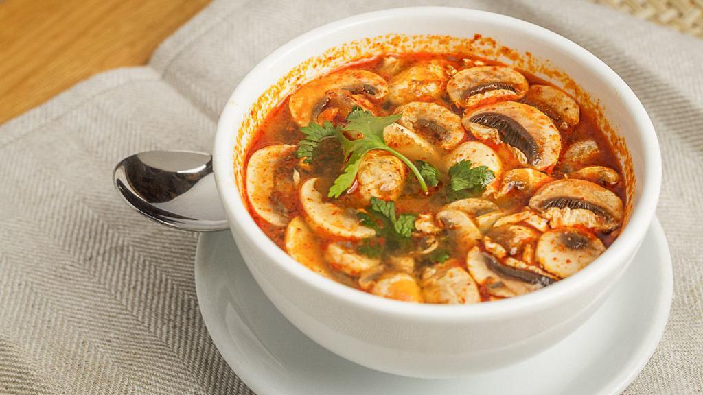  Tom Yum (Spicy Shrimp Soup) · The most famous Thai traditional spicy soup with shrimp,
galangal, mushroom, lemongrass, cilantro, and kaffir lime leaf.